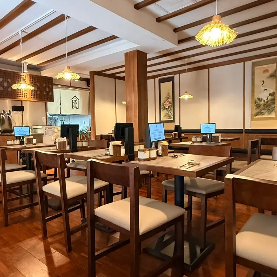 Anok's menu and prices posted at the hanok entrance
