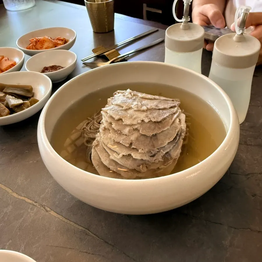Table spread of the three dishes ordered via kiosk at Anok