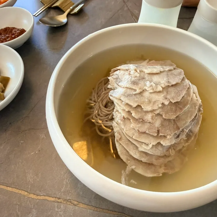 A bowl of Anok's Pyongyang naengmyeon in water broth