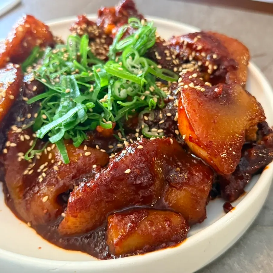Anok's pork tail jjim in a spicy-sweet sauce