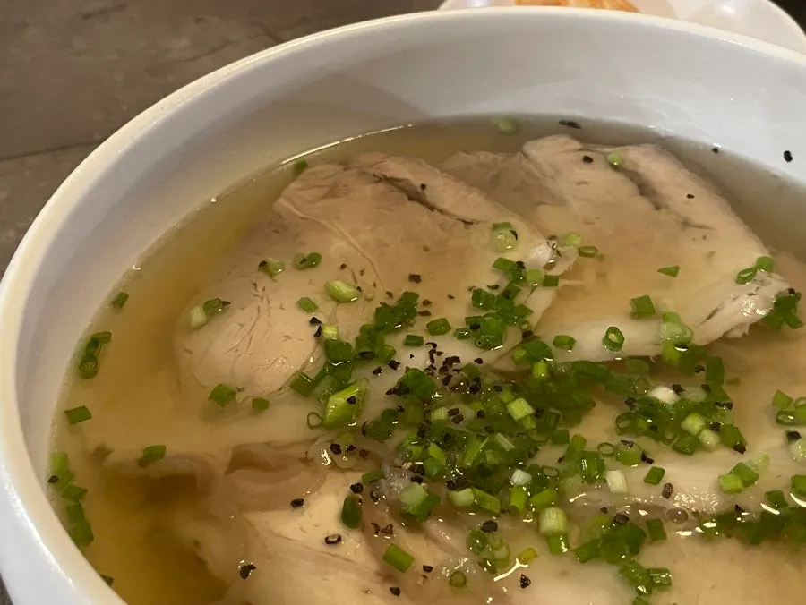 Warm pork gomtang served in a large bowl