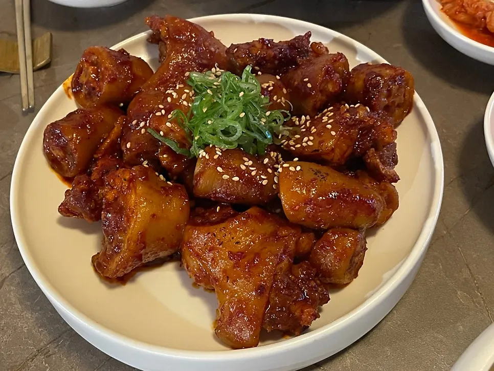A plate of Anok's sweetly seasoned pork tail jjim