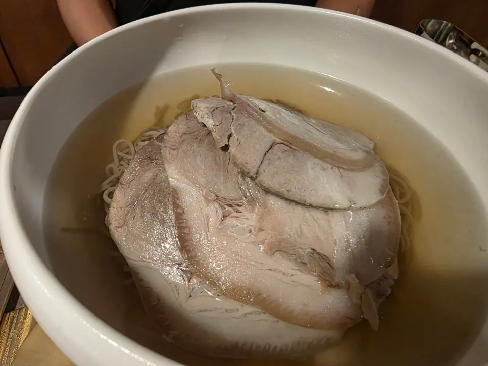 Anok's naengmyeon broth and meat toppings