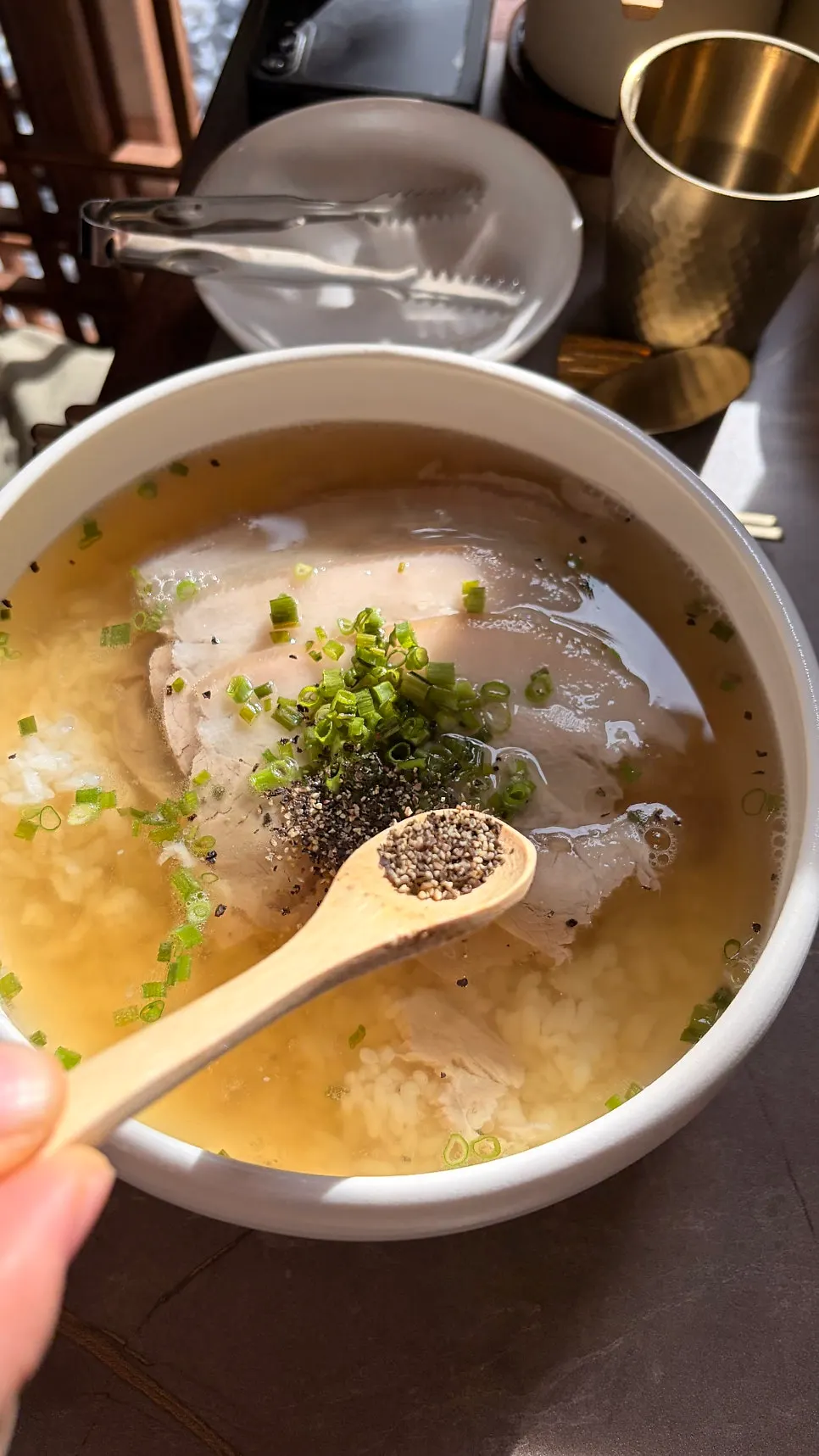 Anok's clear pork gomtang served with rice already added
