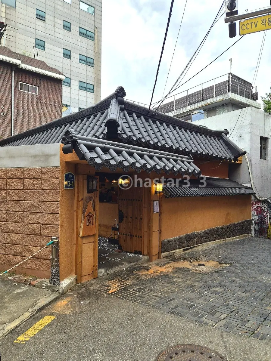 Exterior of Anok, a hanok Korean restaurant in a Hongdae alley
