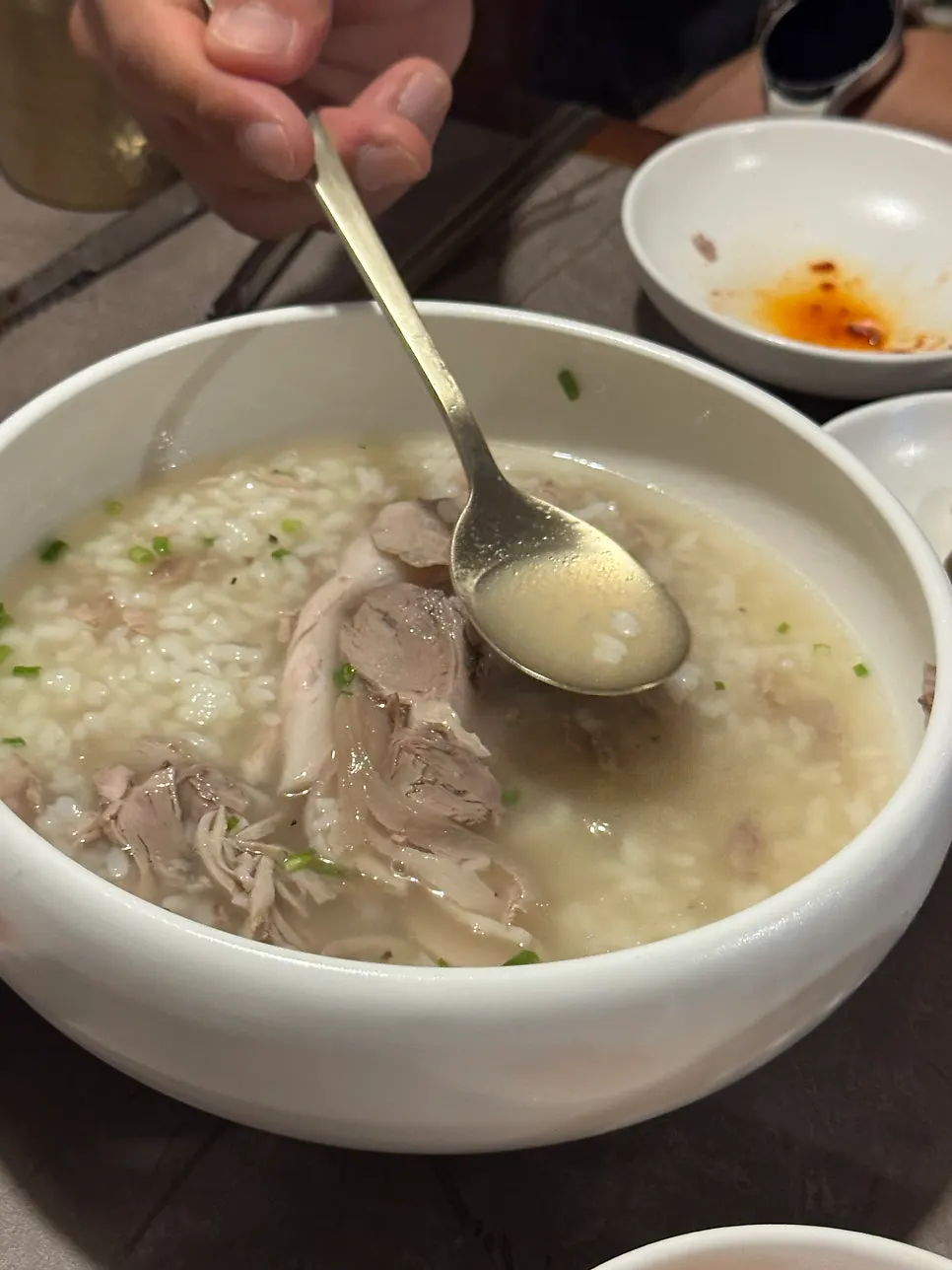 A spoonful of gomtang meat