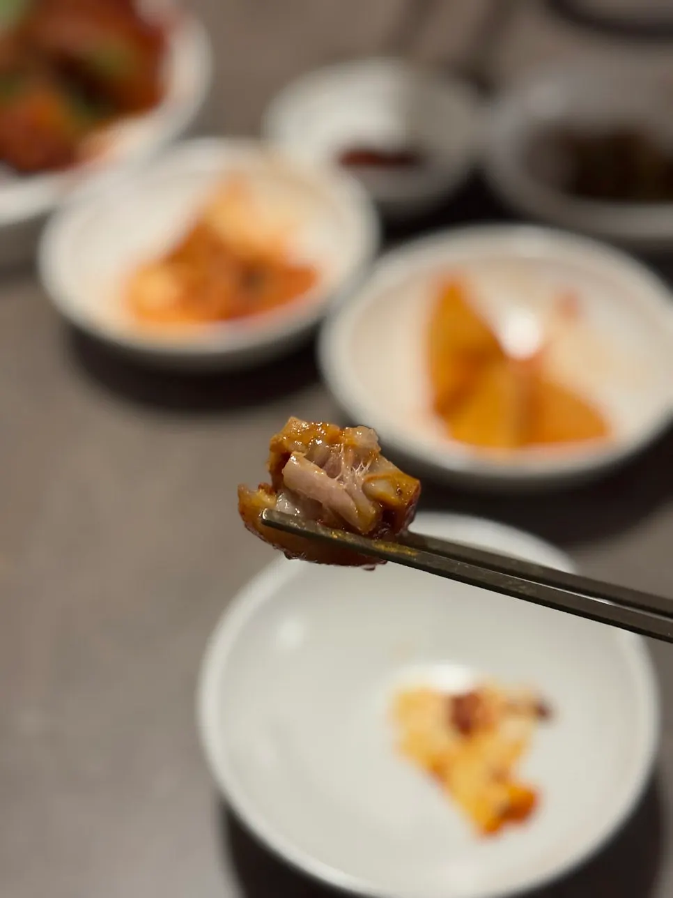 Close-up of the chewy pork tail jjim texture