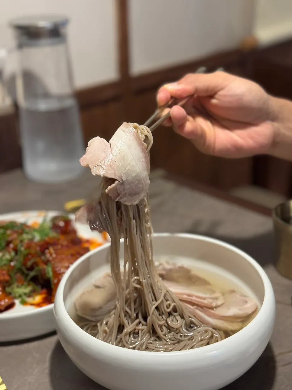 The clean, mild broth of the Pyongyang naengmyeon