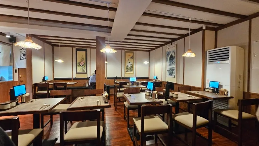 Wood-toned interior of Anok