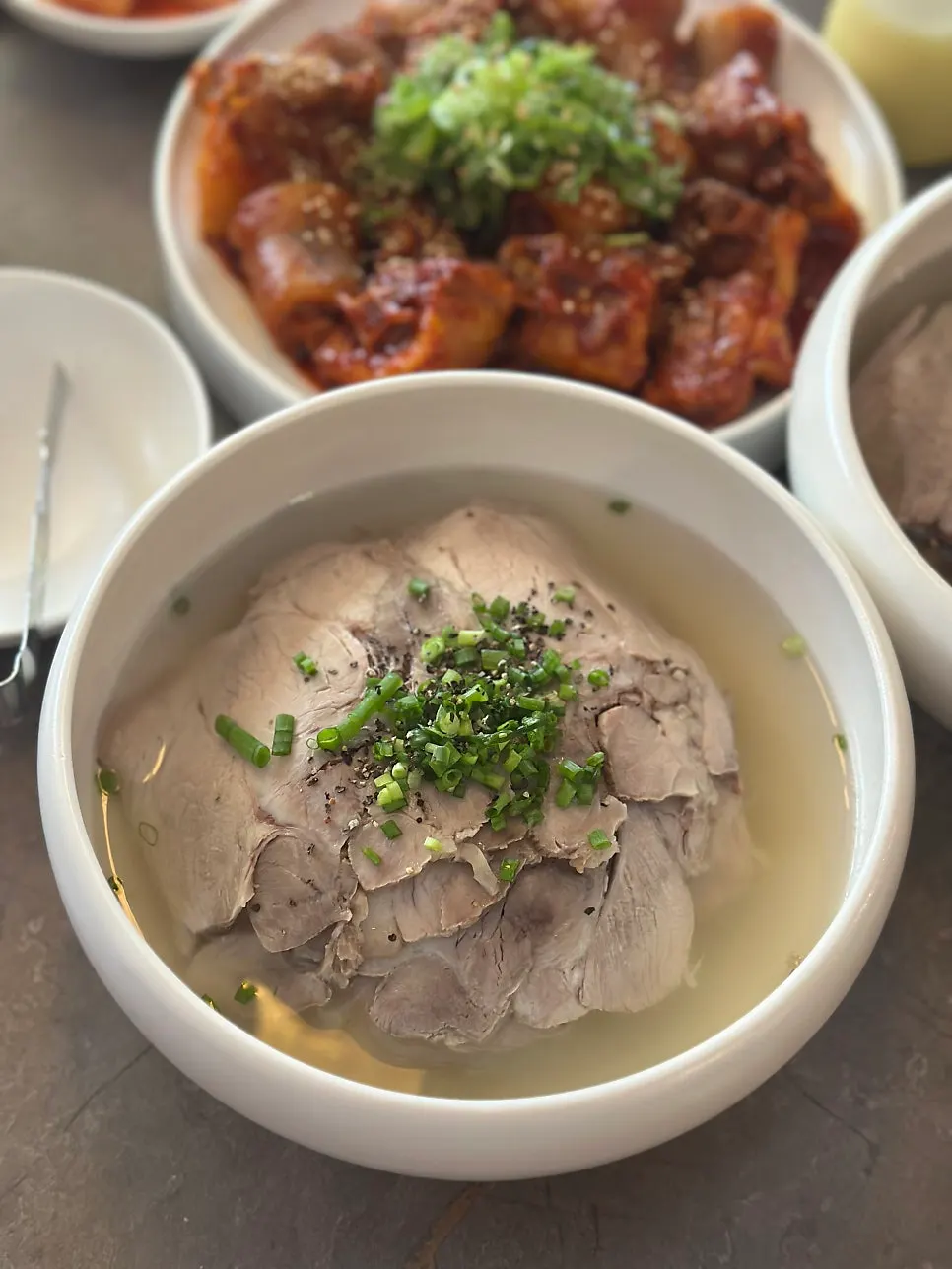 Close-up of Anok's clear pork gomtang broth