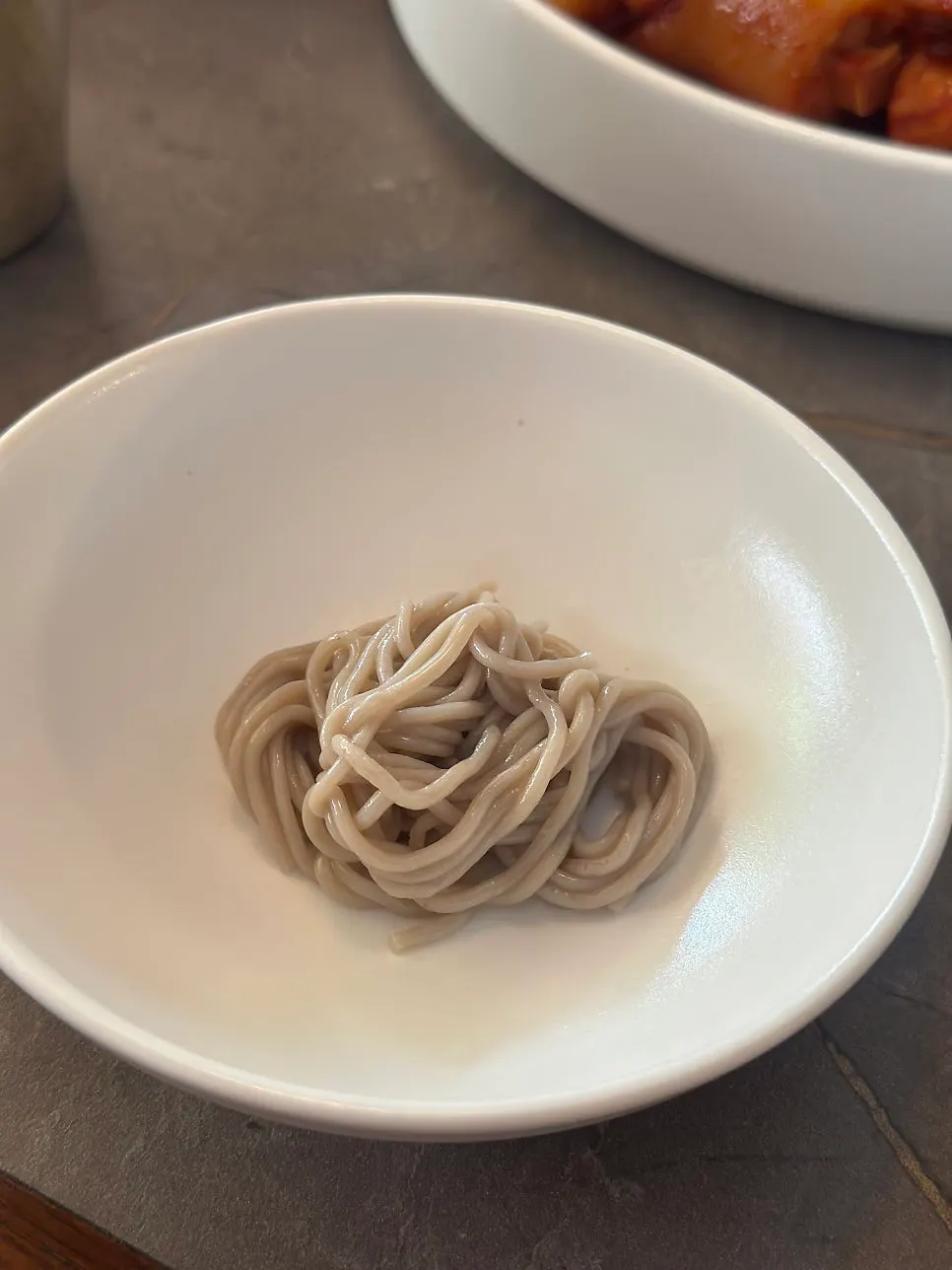 A half-finished bowl of Anok's naengmyeon