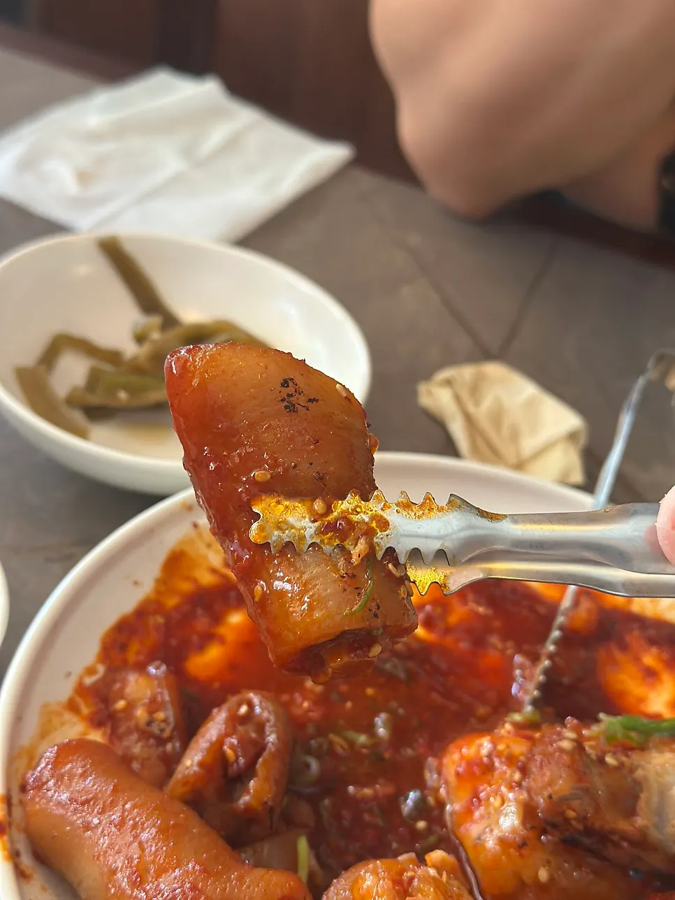 Anok's spicy-sweet pork tail jjim