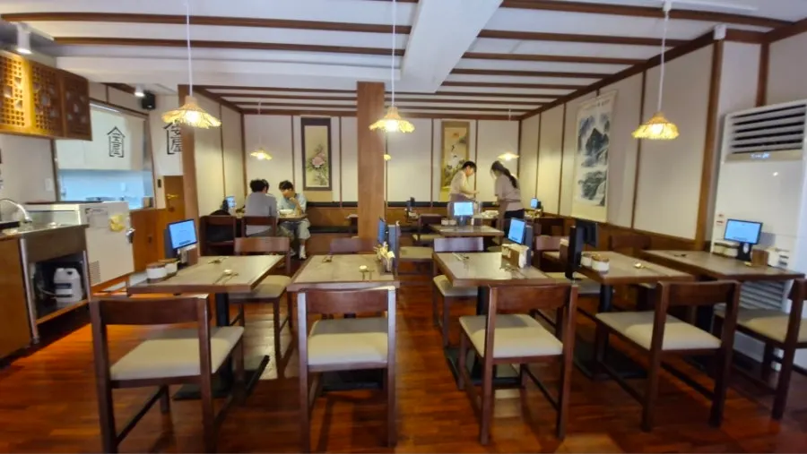 Quiet interior of Anok's dining hall