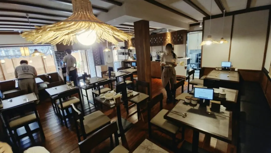 The farthest corner table at Anok