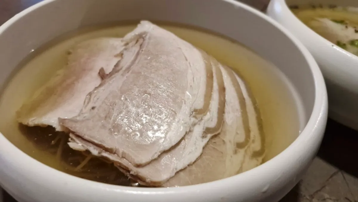 Lifting noodles from Anok's naengmyeon