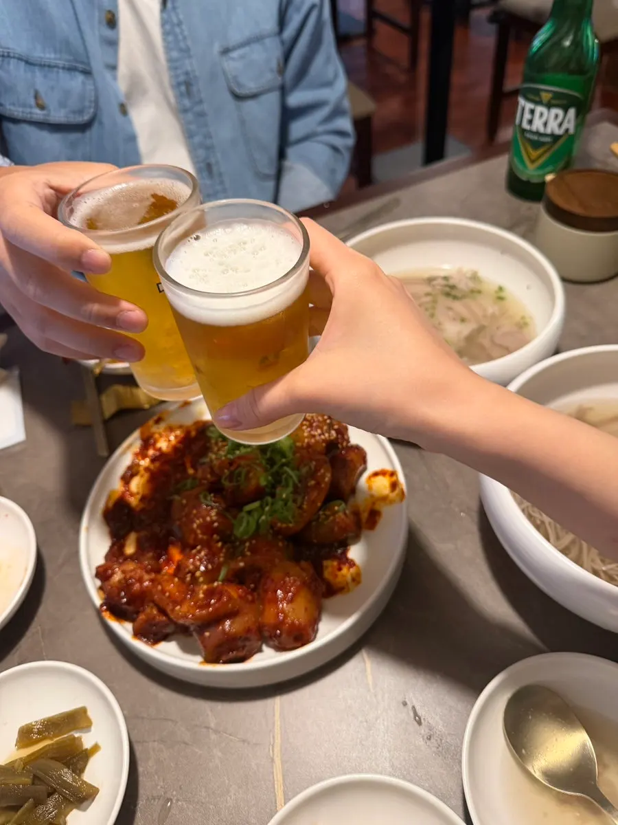 Cheers with a glass of beer at Anok