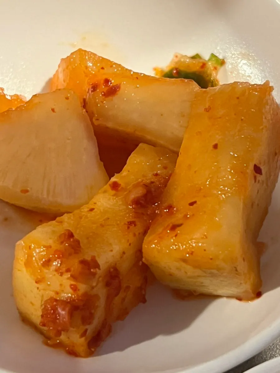 Anok's gomtang served with side dishes