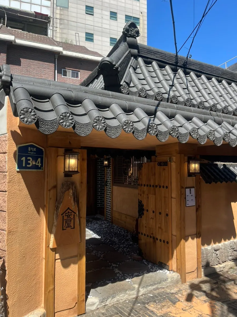 Anok's exterior in the alley off Hongdae's main street