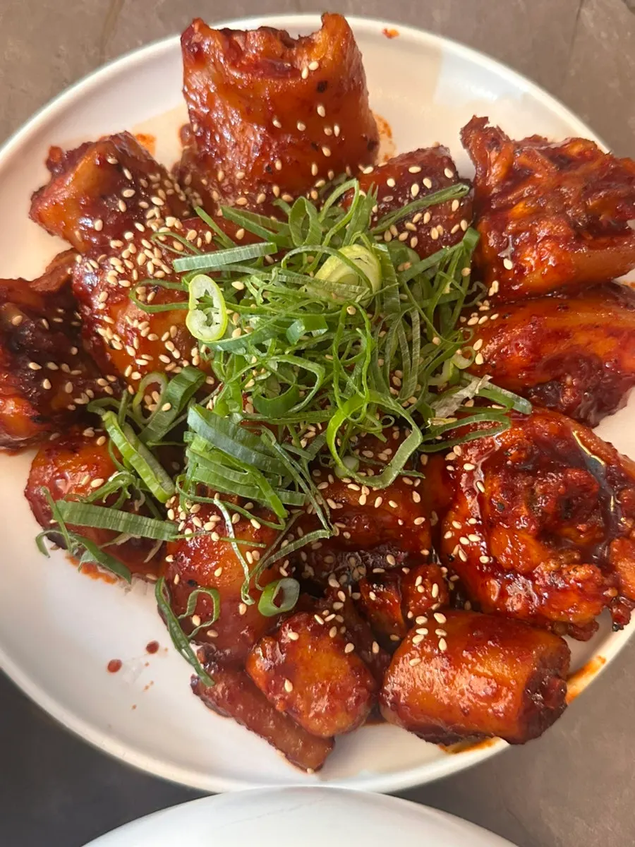 Anok's richly seasoned braised pork tail