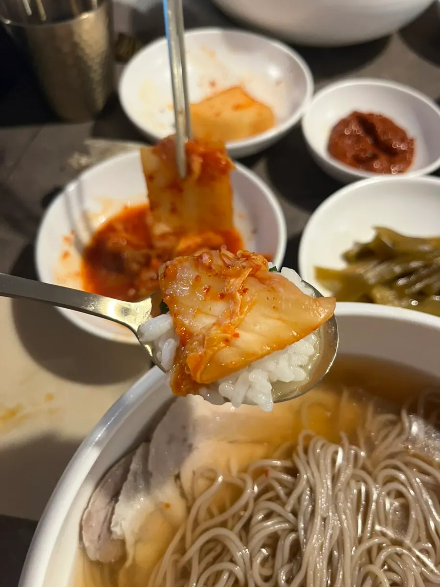 Anok's clear pork gomtang served in a stone bowl