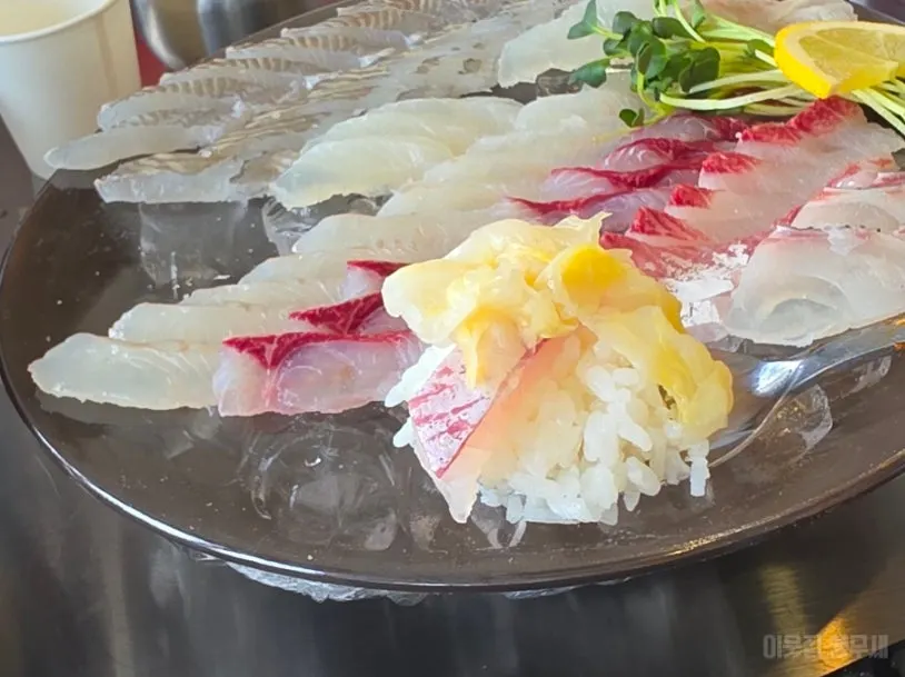 Generous platter of seasonal assorted sashimi