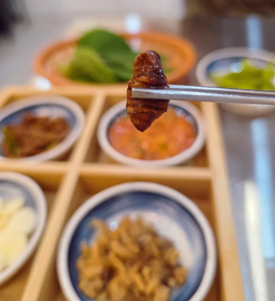 Side dishes including silkworm pupae