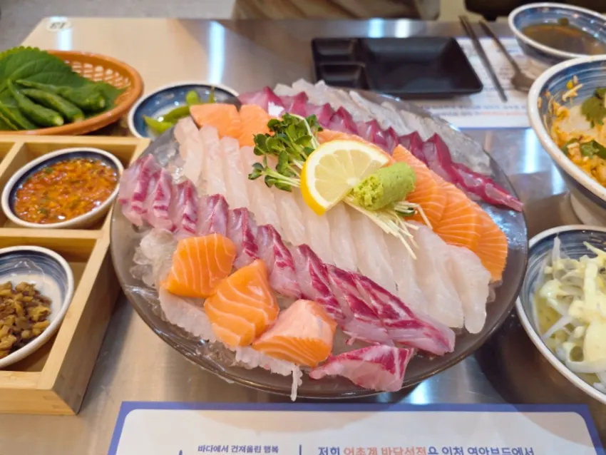 Generously filled small salmon assorted sashimi platter