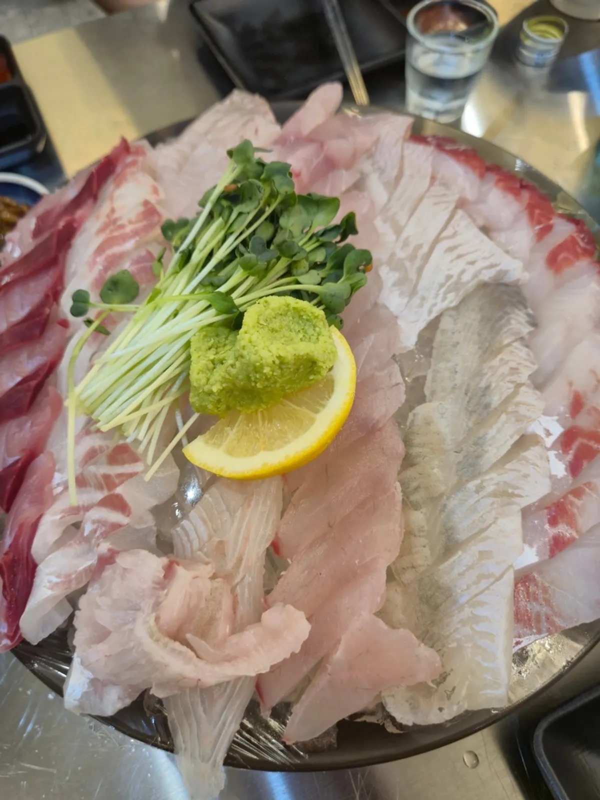 Medium plate of seasonal assorted sashimi