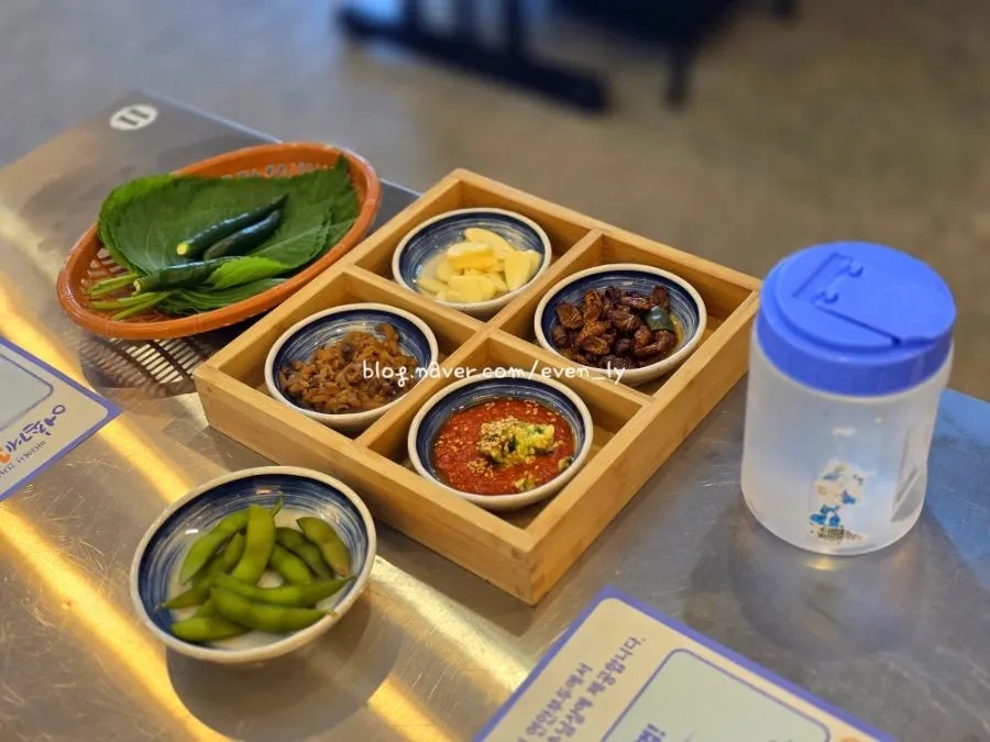Basic banchan spread including shiitake wasabi and white kimchi