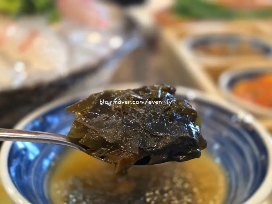 Basic banchan and a bottle of drink before the sashimi arrives