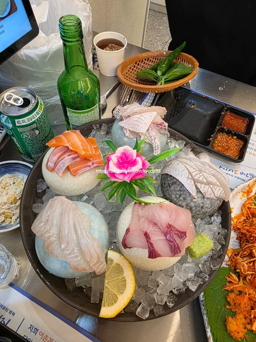 A freshly served plate of live squid sashimi