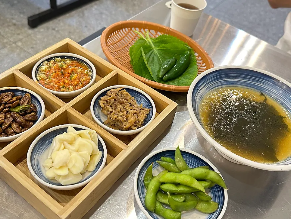 Basic side dishes and lettuce wraps set on the table