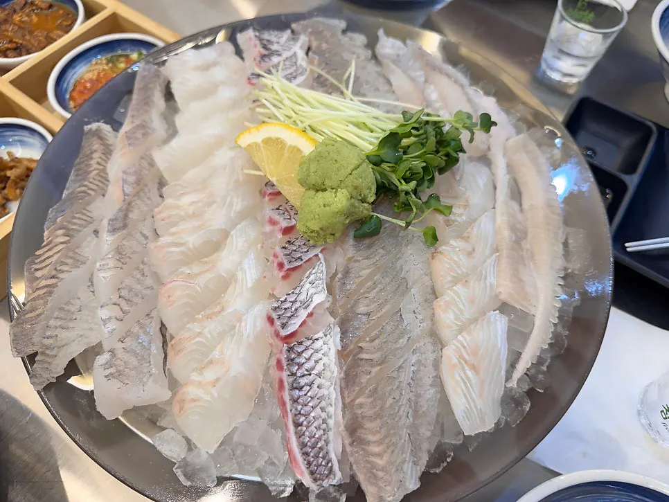 A plate of large red snapper mixed sashimi