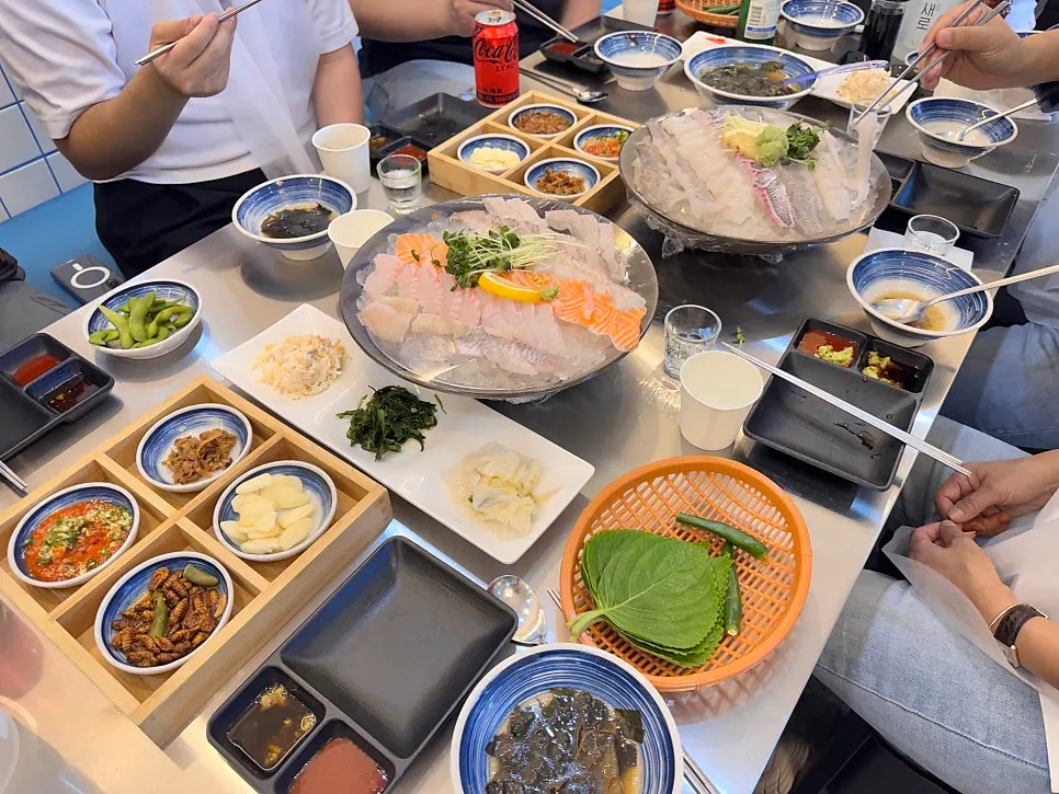 Somyeon noodles mixed into the hoe-muchim broth