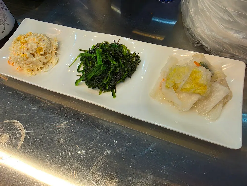 A piece of conger eel sashimi included in the mixed platter