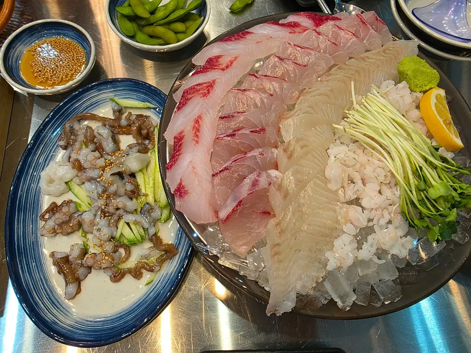 An empty sashimi plate cleared without leftovers