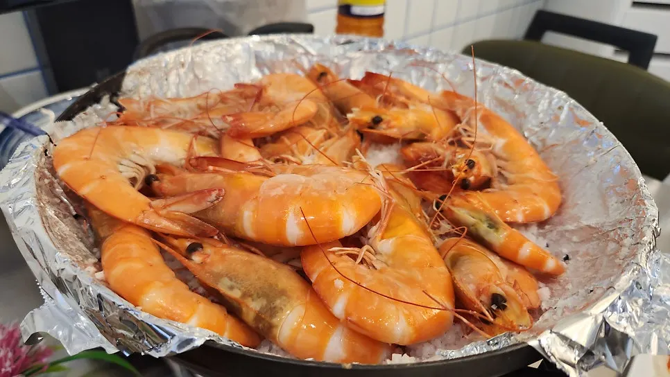 Bright red, perfectly cooked salt-grilled fresh shrimp