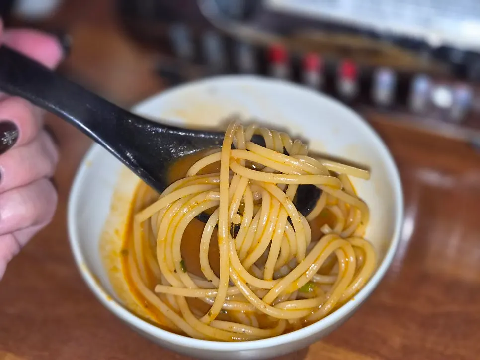 Serving tomato jjamppong pasta