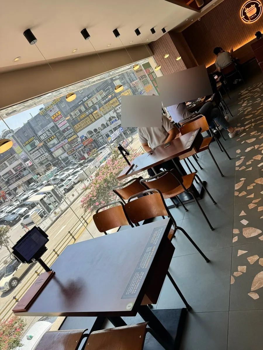 Spacious hall seating at Dongyang Sotbap Ansan Main Branch