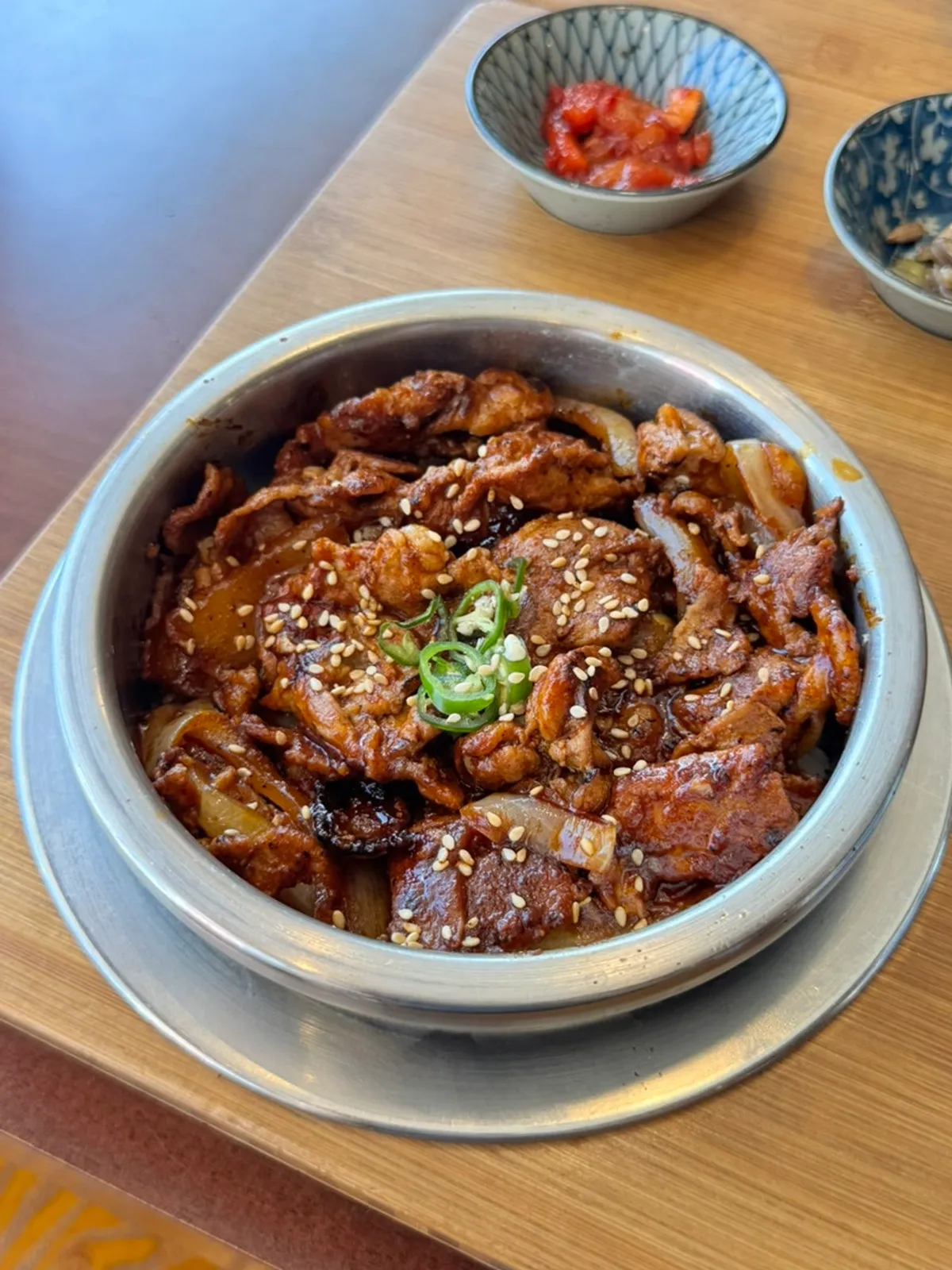 Full table spread of pot rice and sides at Dongyang Sotbap Ansan Main Branch