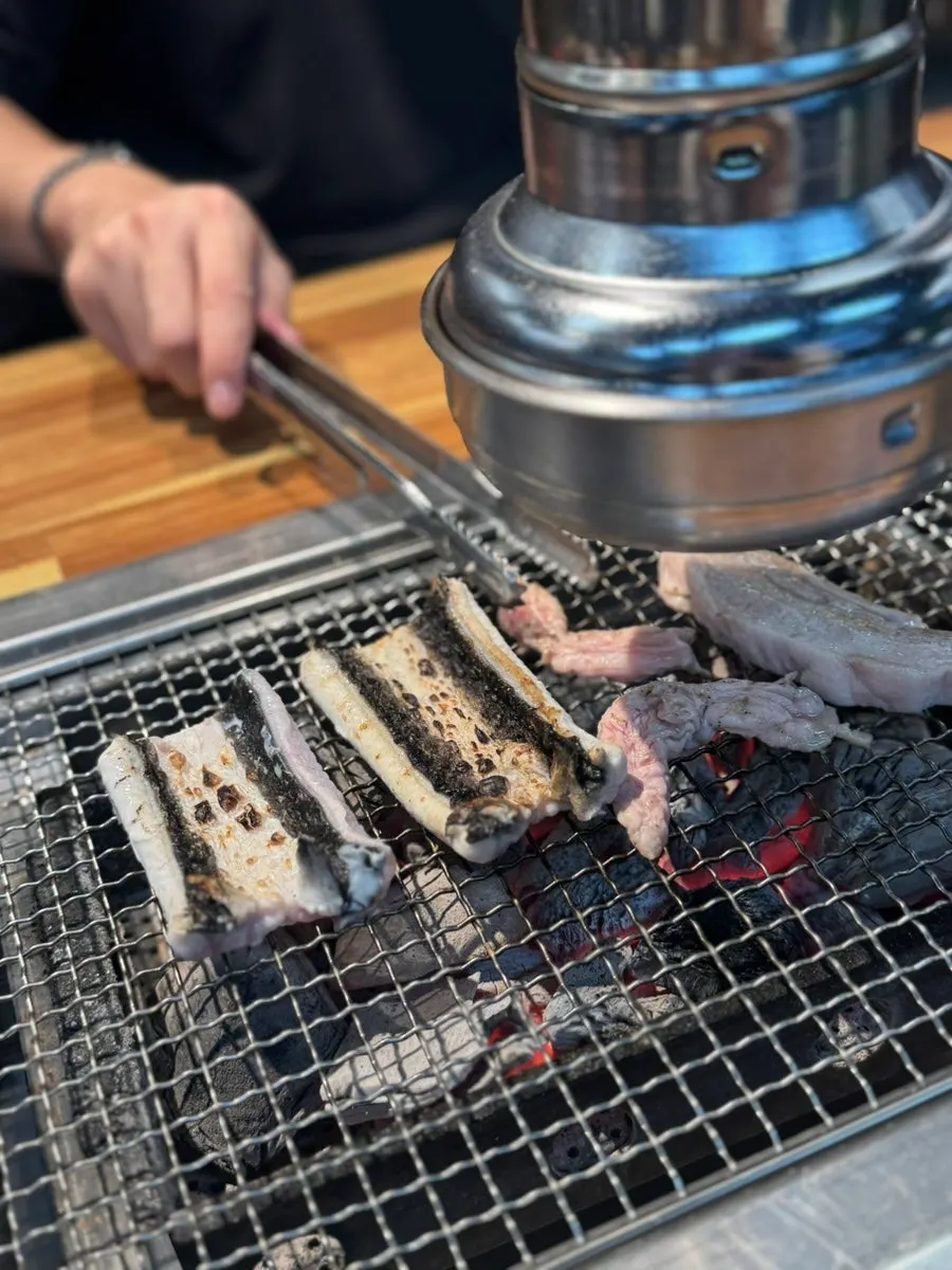 Eel and chicken neck grilled golden over charcoal