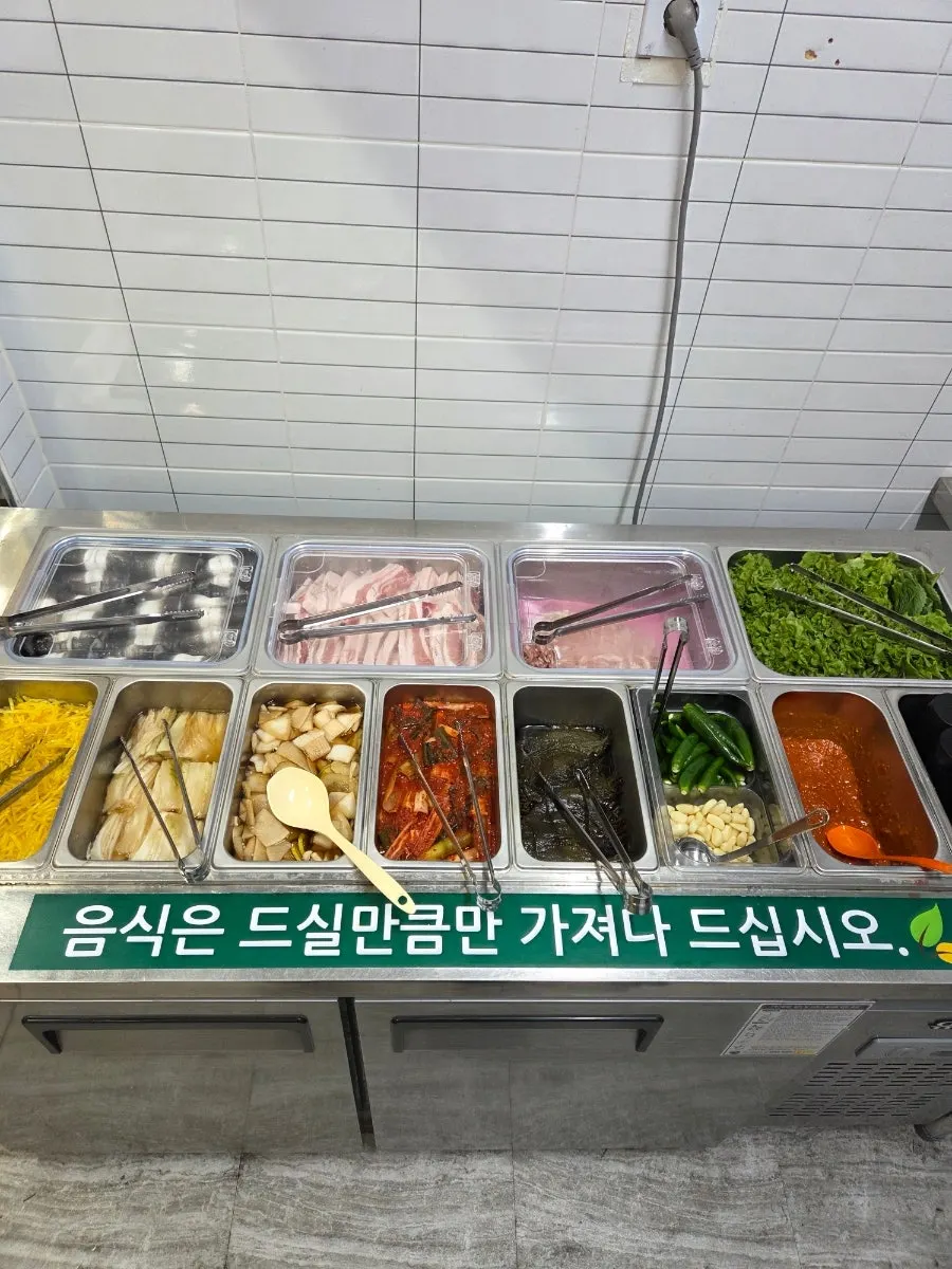 Main meat items displayed at the self-serve corner