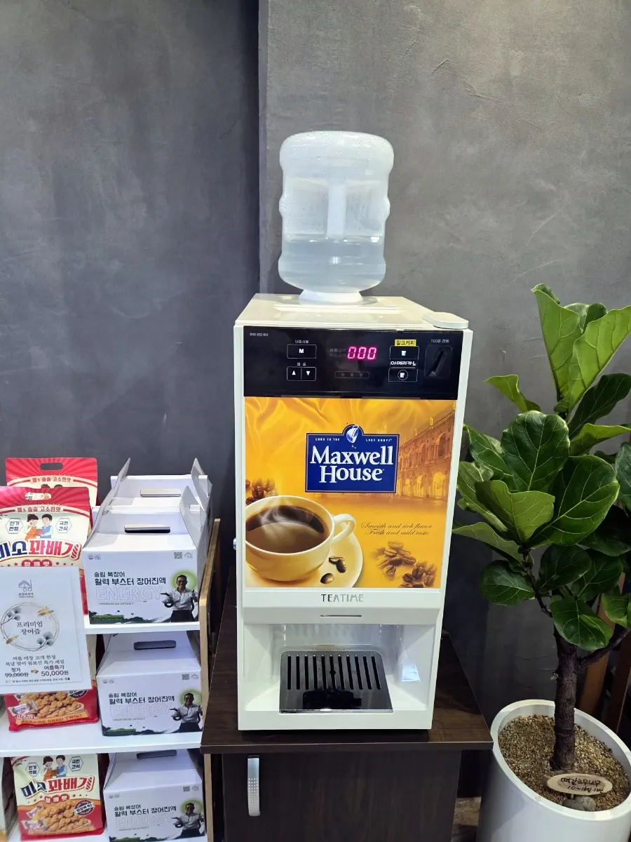 Coffee vending machine in one corner of the restaurant