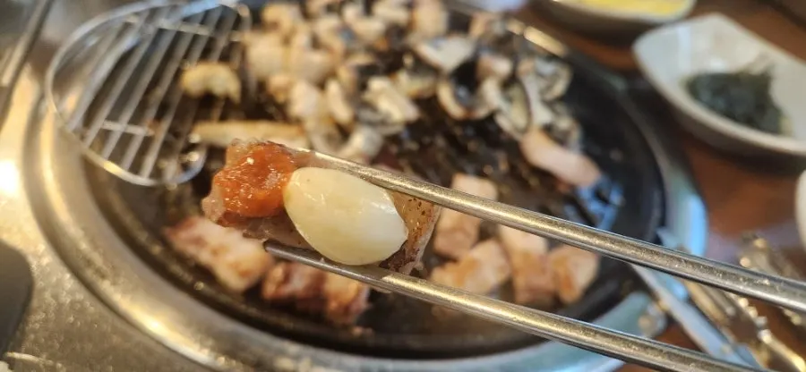 Eel wrap with ginger and white kimchi