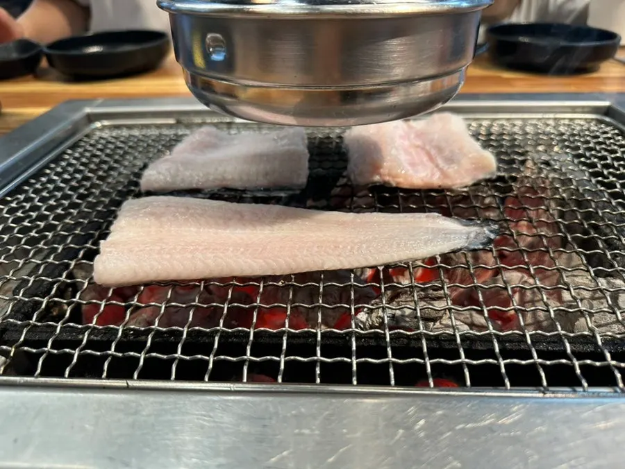 Plate of plump freshwater eel with pork belly and chicken neck