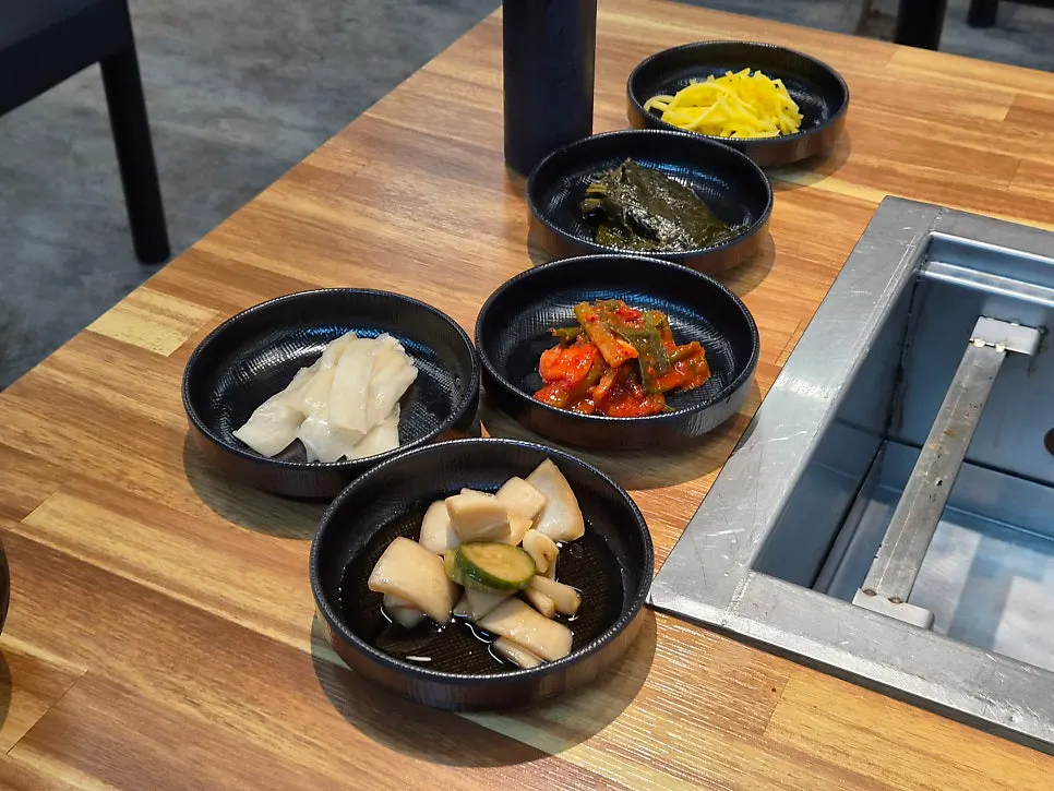 Assorted side dishes served after ordering the all-you-can-eat set
