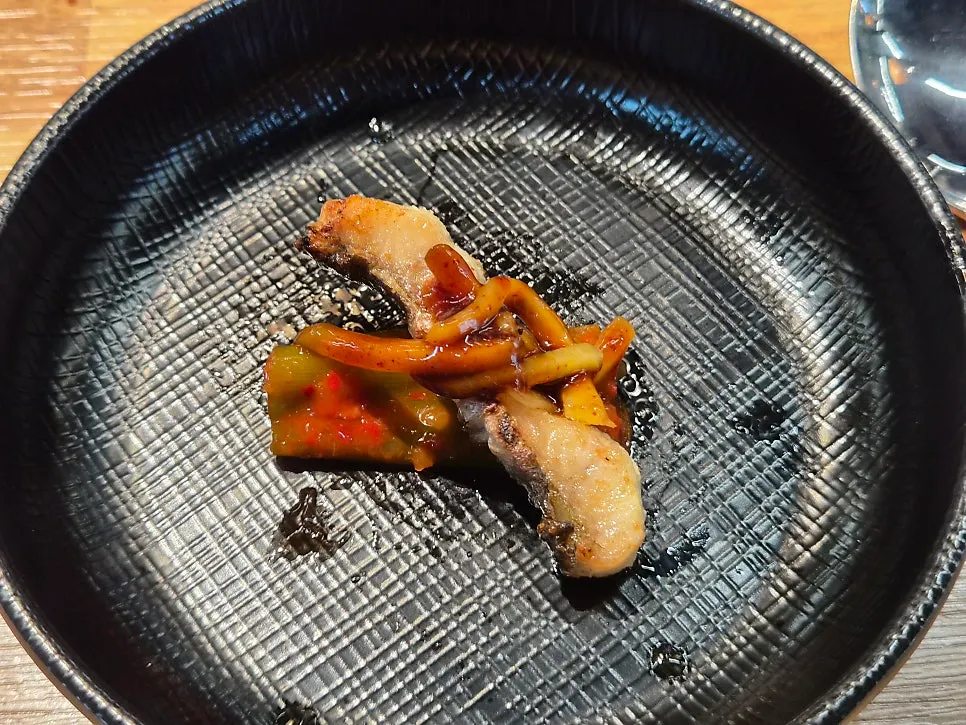 Grilled eel served with scallion kimchi