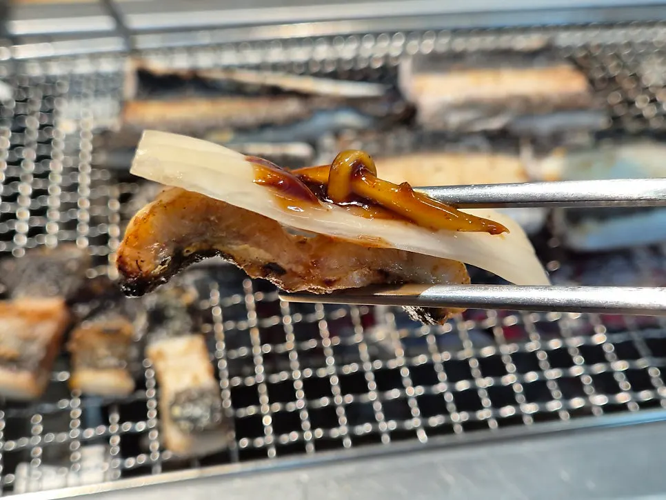 Grilled eel wrapped in baek-kimchi