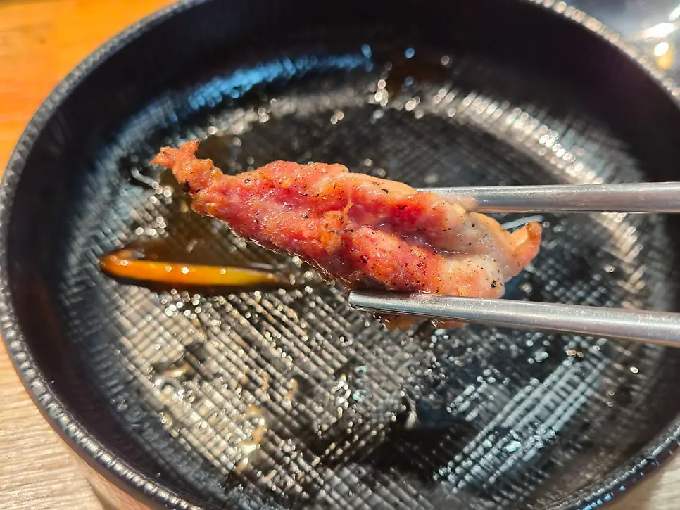 A seasoned piece of chicken neck meat