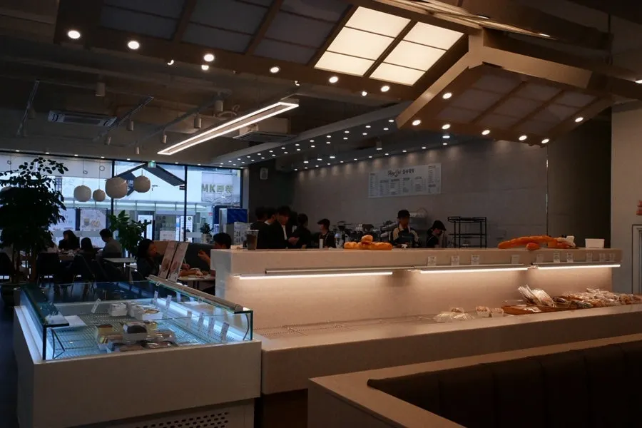 Café interior with a variety of tables